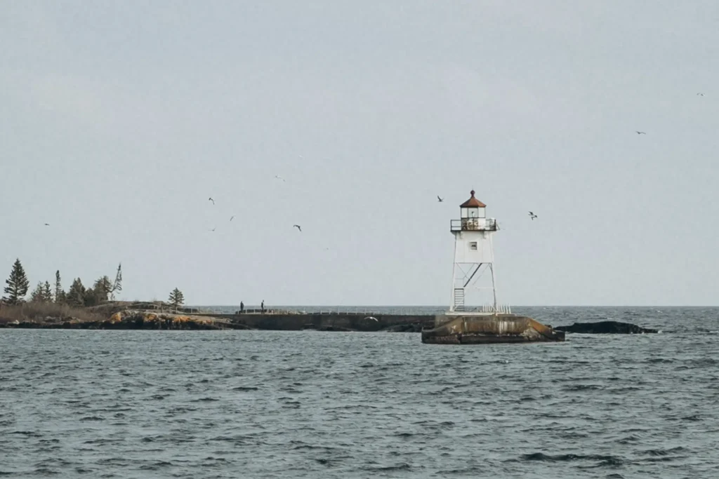 historic lighthouse on lake superior in artist's point grand marais mn